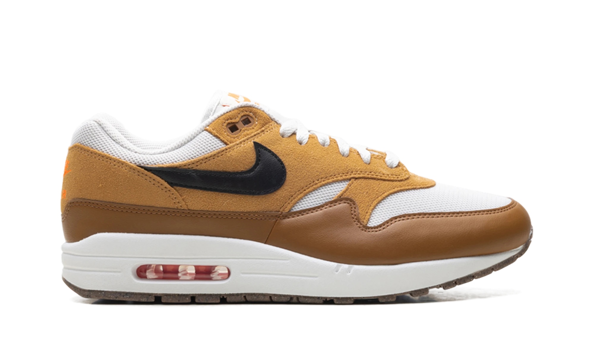 Basket Nike Air Max 1 Essential British Tan Light Bone en cuir beige et noir, disponible en France, Suisse, Belgique et Luxembourg — vue de profil extérieur.