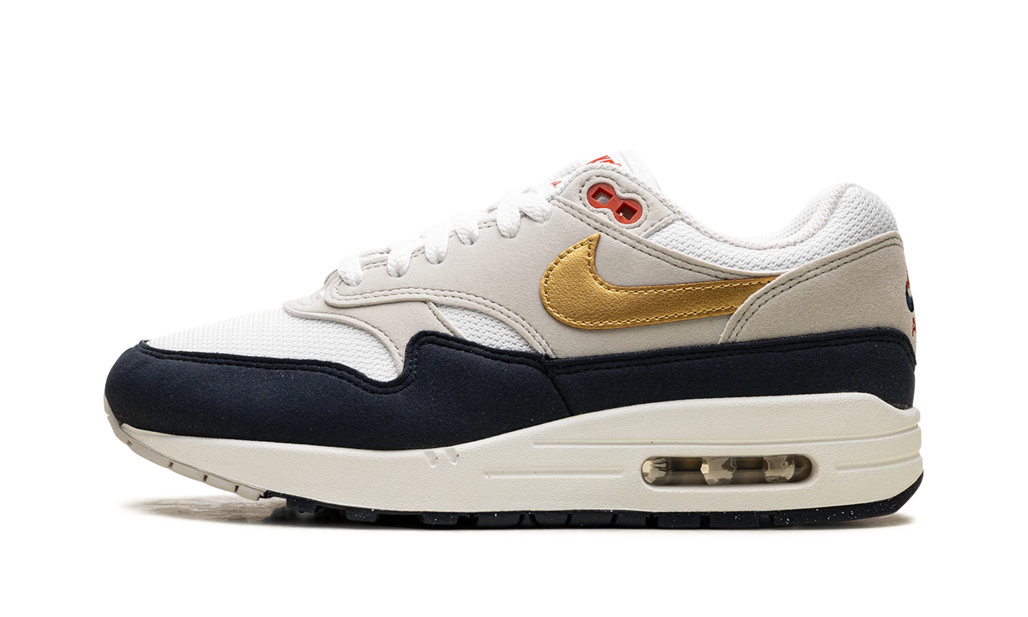 Détail du côté intérieur de la basket Nike Air Max 1 Olympic noir, blanc et gris.