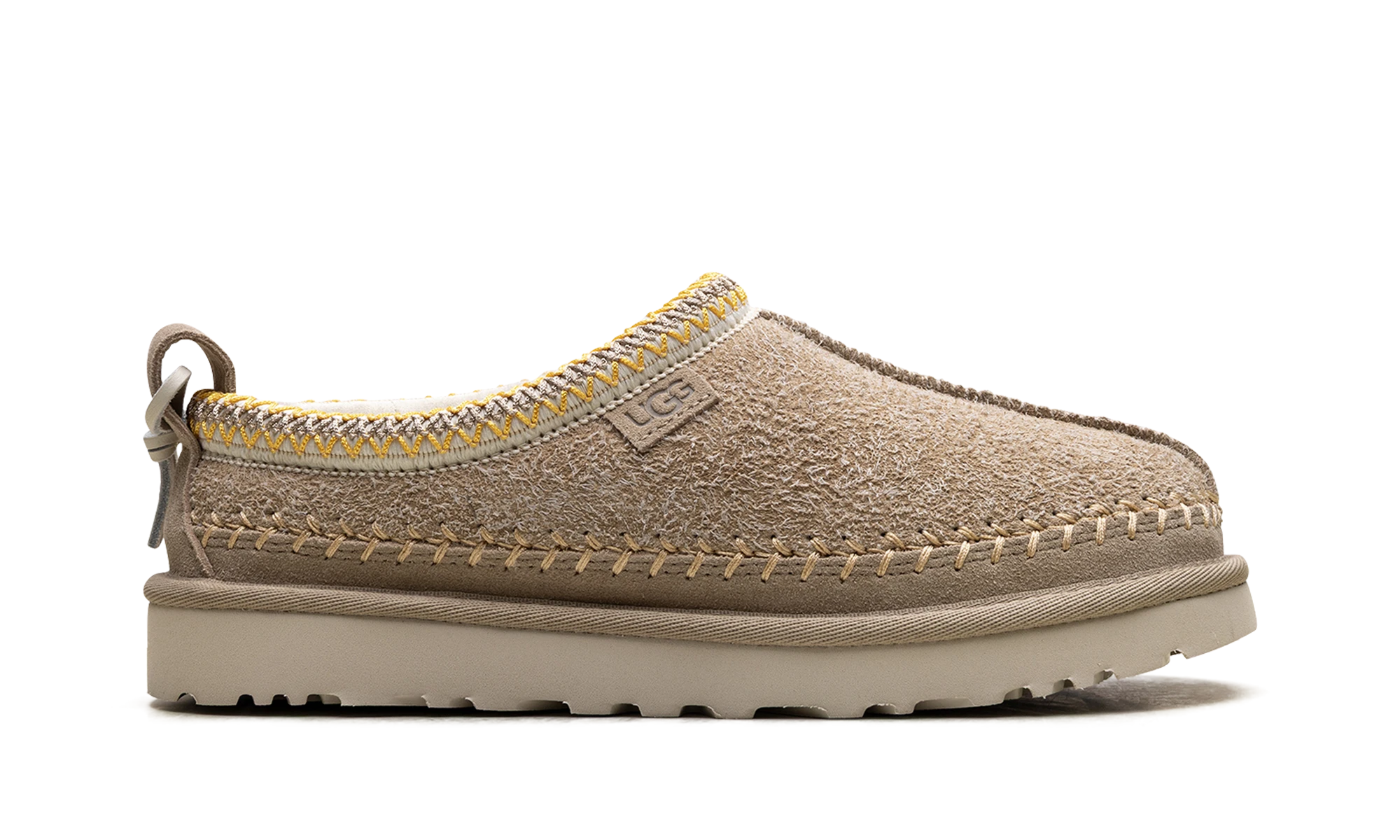 Pantoufle UGG Tasman Biarritz Slipper Mustard Seed en cuir jaune, disponible en France, Suisse, Belgique et Luxembourg — vue de profil extérieur.