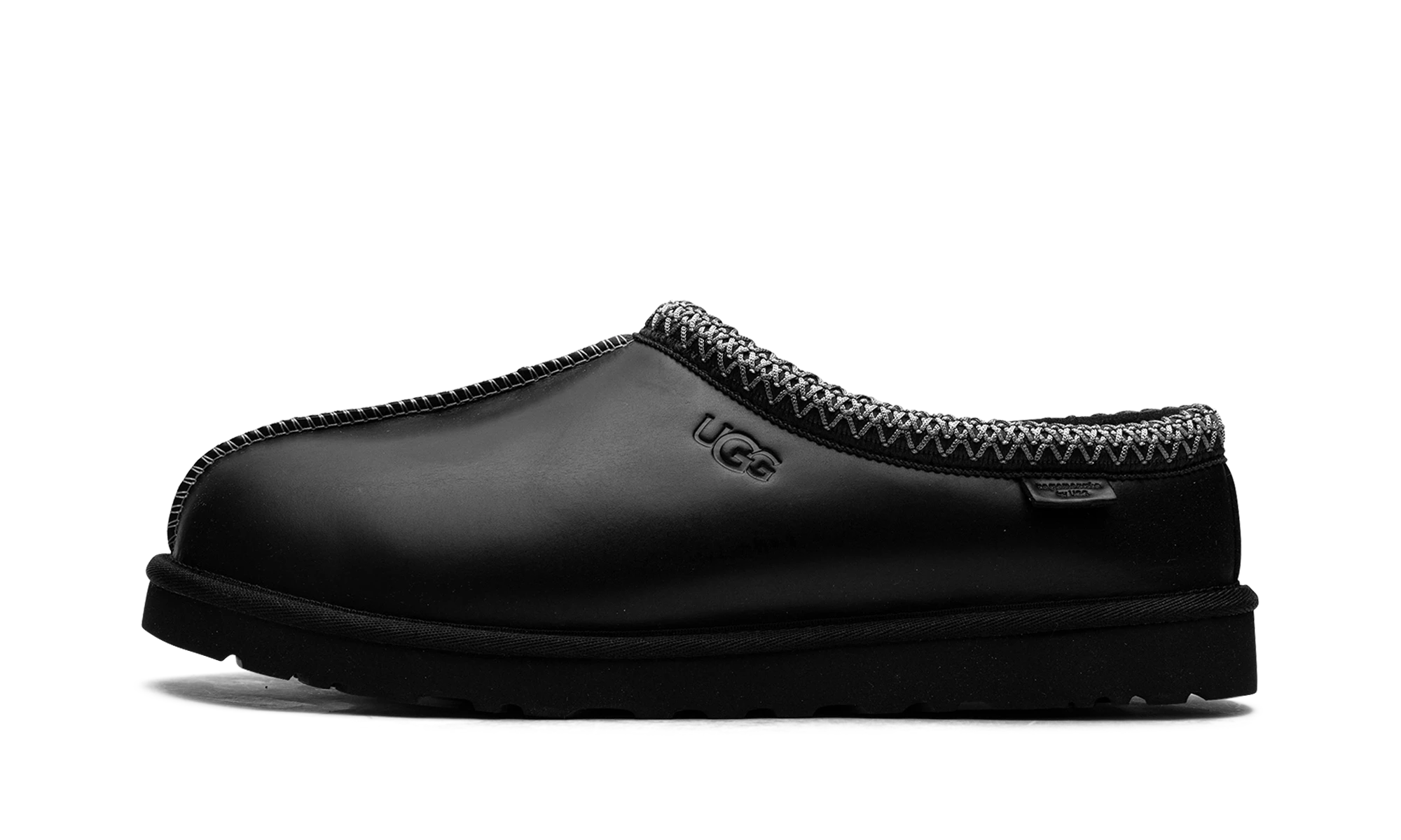 Détail du côté intérieur de la pantoufle UGG Tasman LTHR Regen Slipper Black noir.