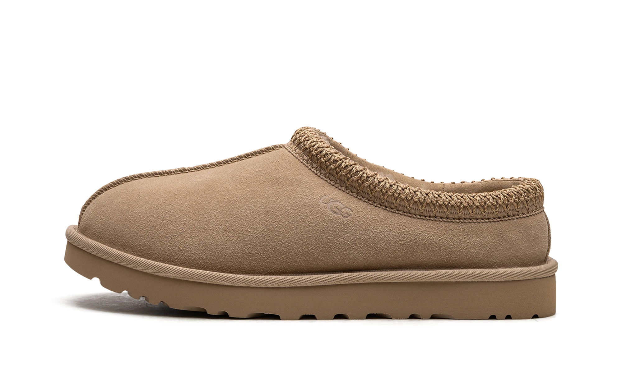 Détail du côté intérieur de la pantoufle UGG Tasman Slipper Sand TNL beige.