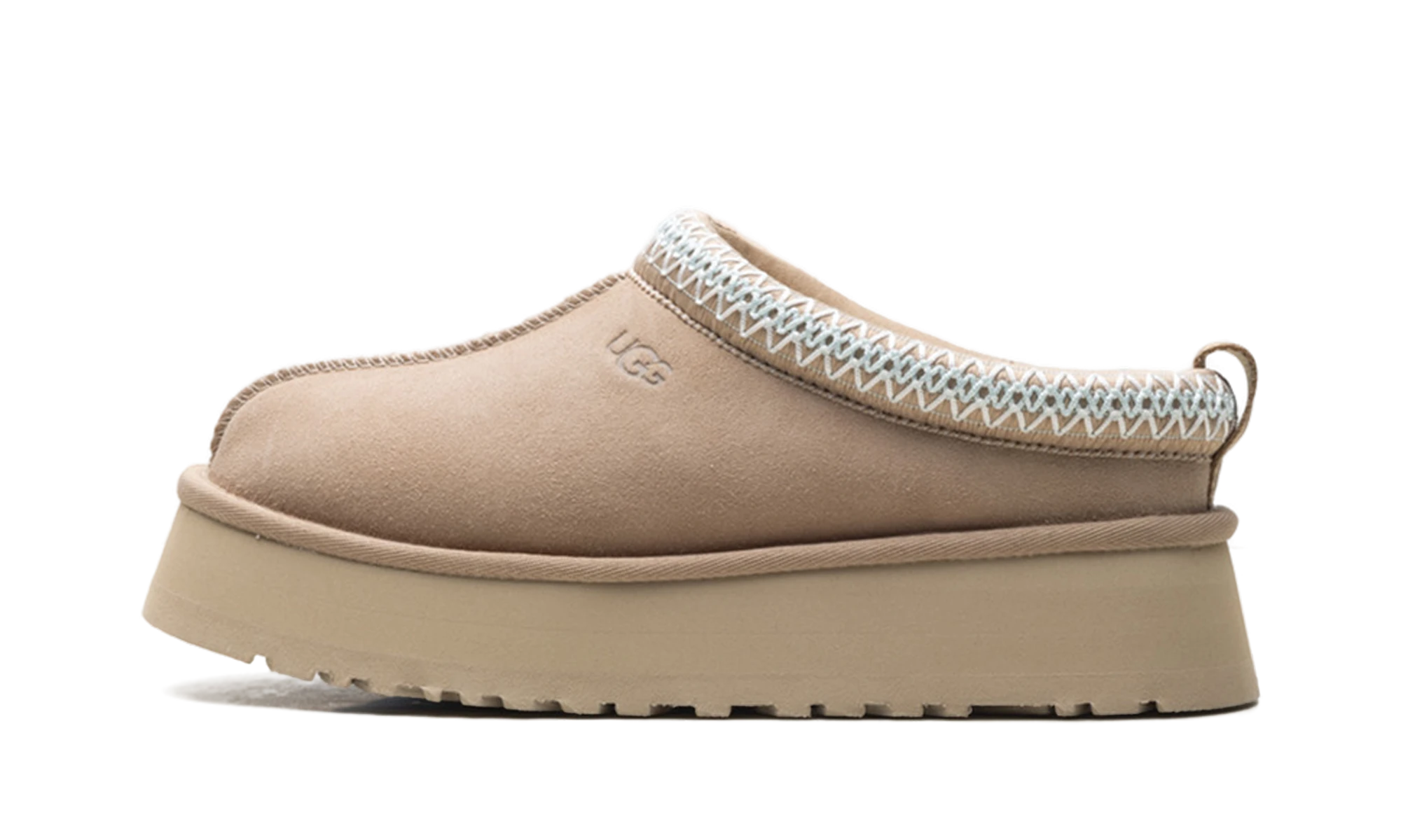 Détail du côté intérieur de la pantoufle UGG Tazz II Slipper Sand beige.