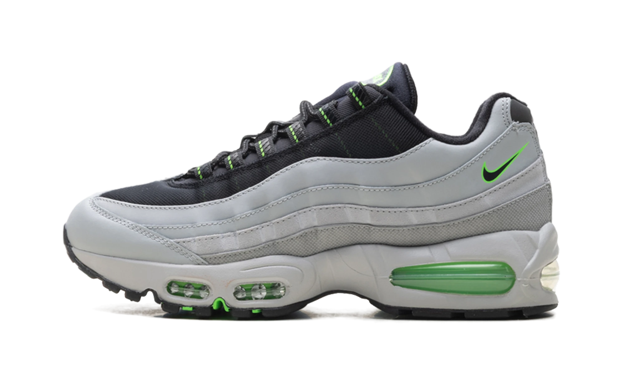 Détail du côté intérieur de la basket Nike Air Max 95 Racing Pack Light Smoke Green Strike gris, vert et blanc.