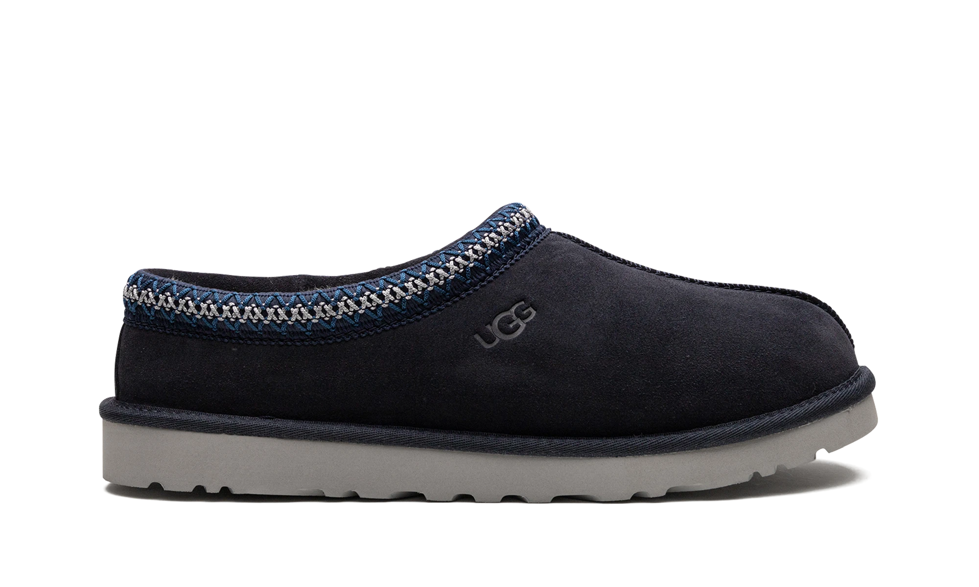 Pantoufle UGG Tasman Slipper True Navy en cuir bleu, disponible en France, Suisse, Belgique et Luxembourg — vue de profil extérieur.