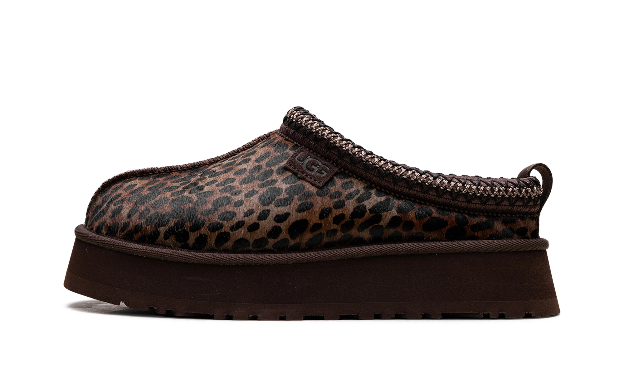 Détail du côté intérieur de la pantoufle UGG Tazz Caspian Slipper Burnt Cedar multicolore.