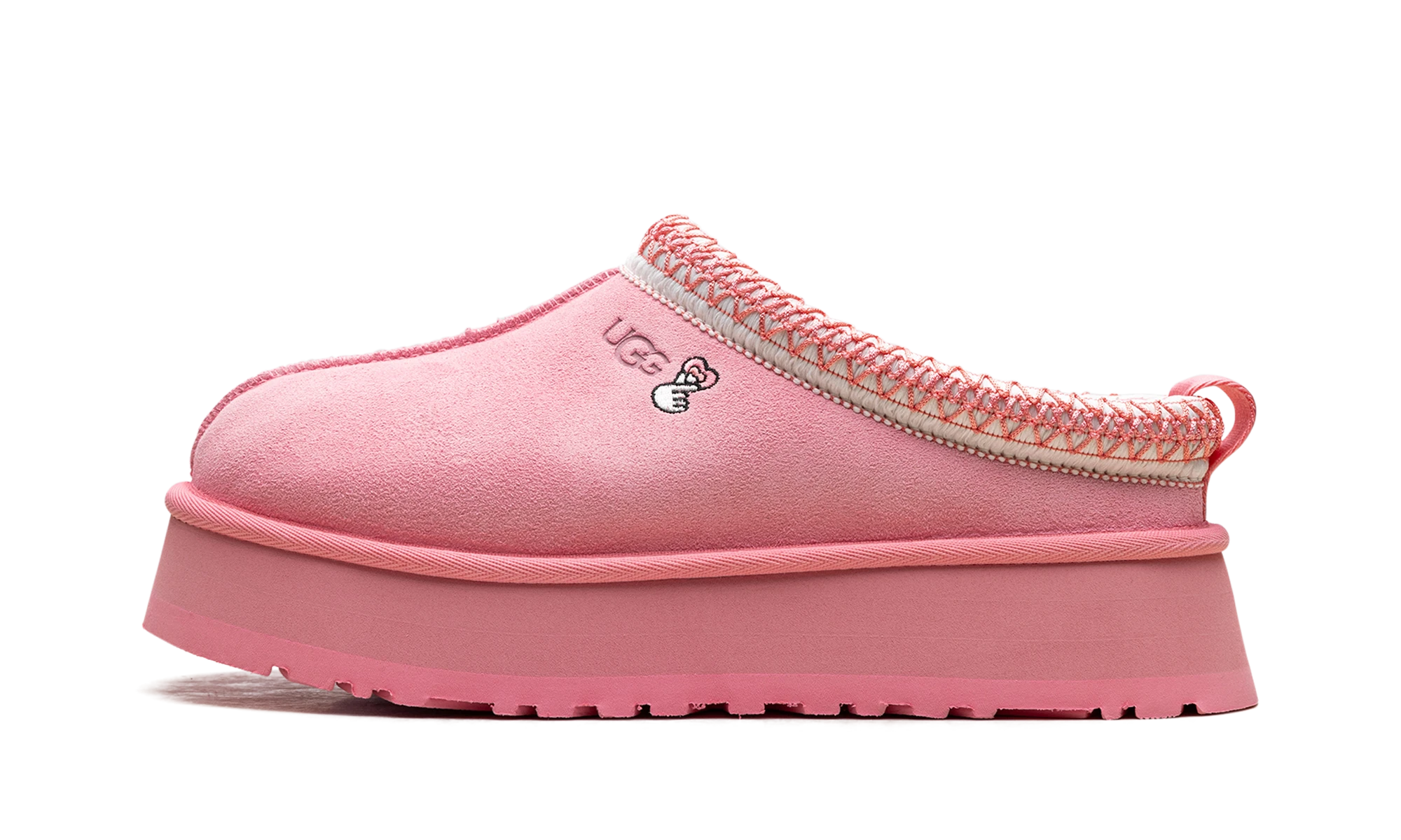 Détail du côté intérieur de la pantoufle UGG Tazz Love '25 Slipper Tropical Pink rose.